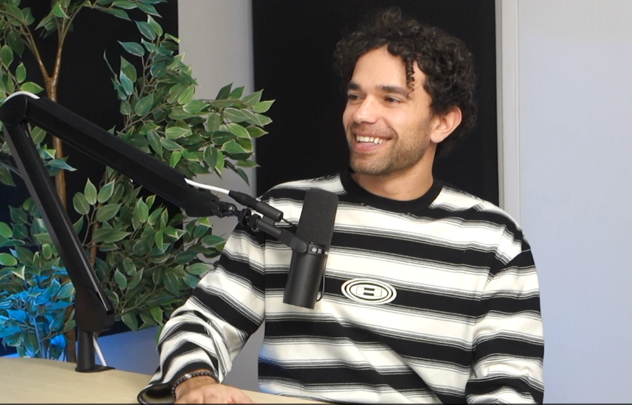 Jason laughing at the microphone